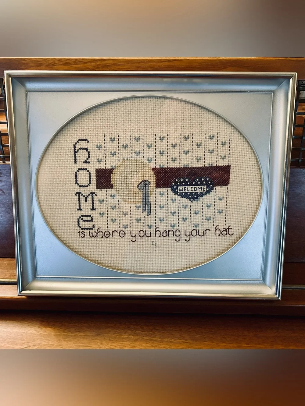 Framed Cross Stitch “Home is Where You Hang Your Hat”